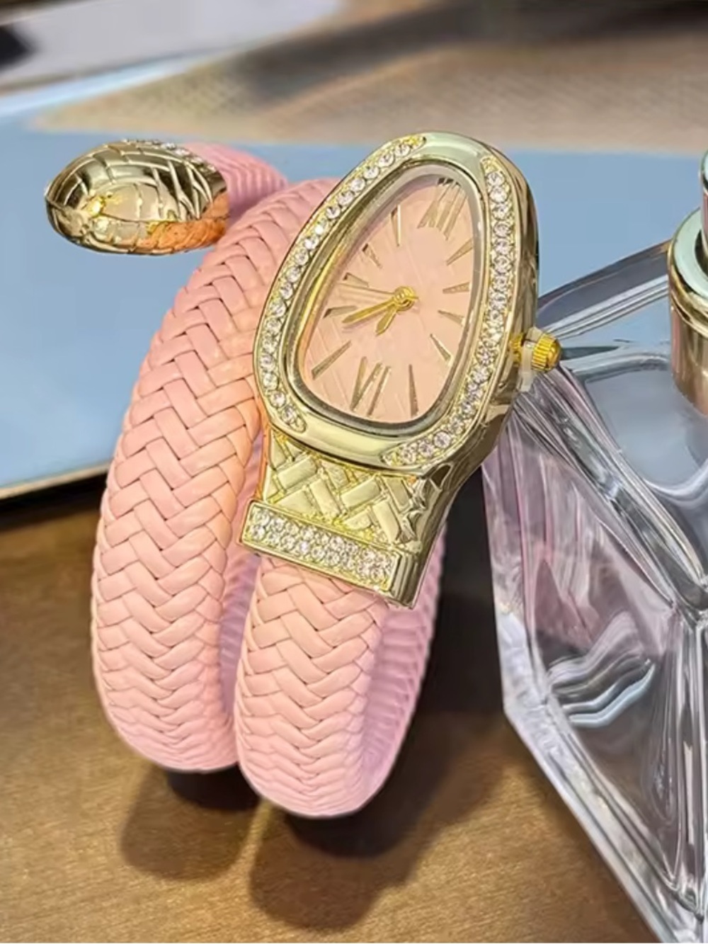 Serpentine Elegant Pink Braided Wrap Watch with Gold Crystal Accents